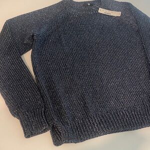 Woman’s Blue Sweater